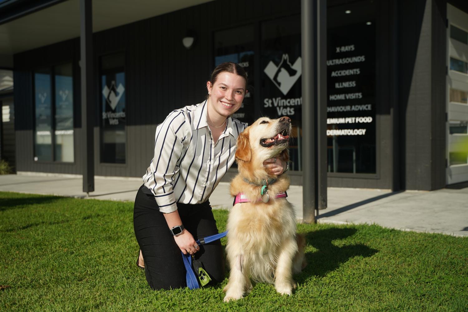 Dog being held by one of our staff